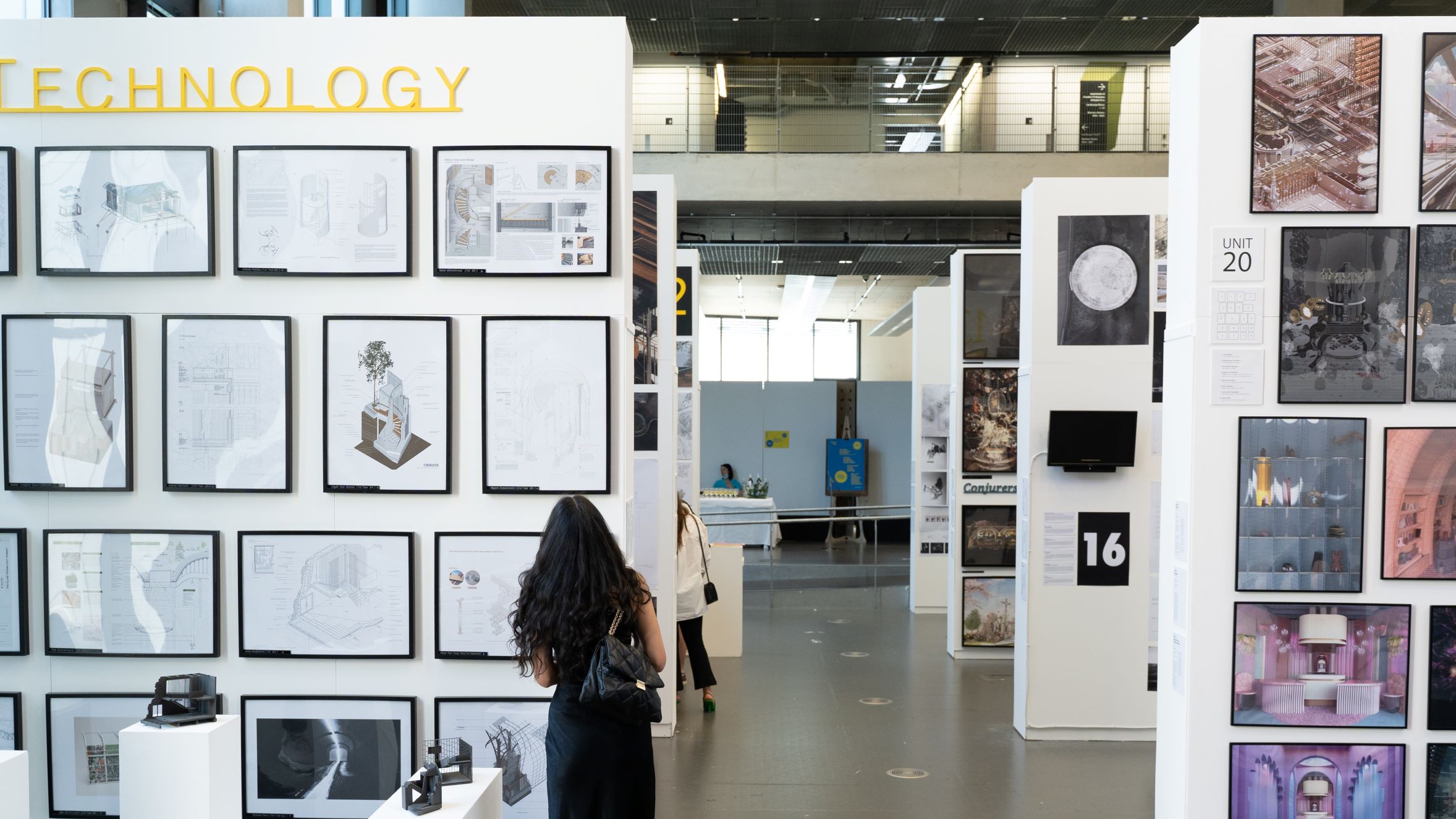 Girl looking at design exhibition