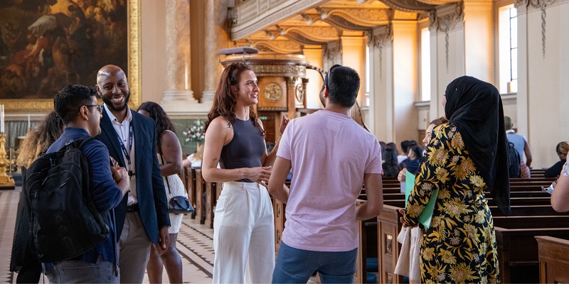 An image of the Mentoring team networking at the Career Mentoring Ceremony.